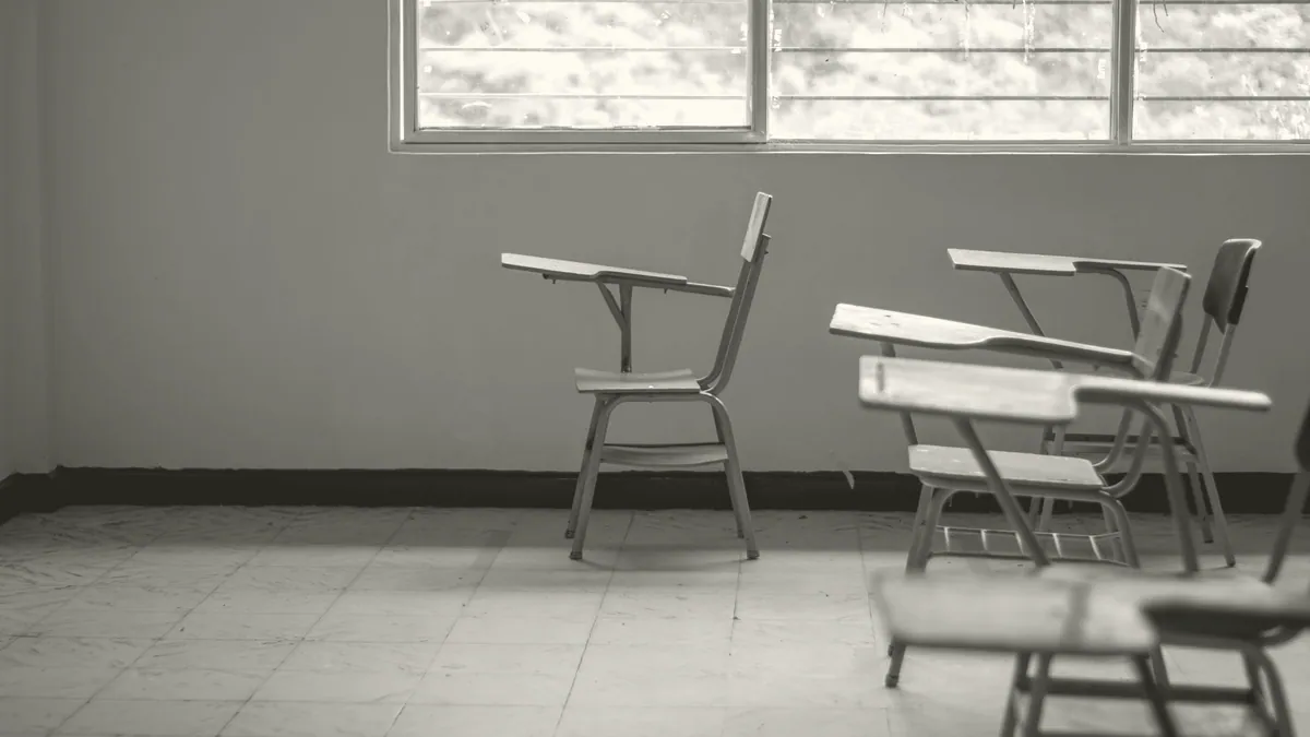 An empty room with rain on the window.