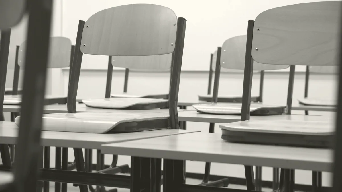 Empty desks in a classroom.